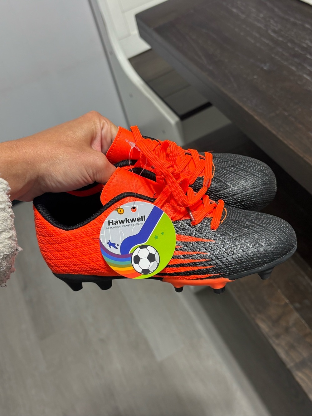 Hawkwell Kids' Soccer Cleats in Neon Orange and Charcoal Gray